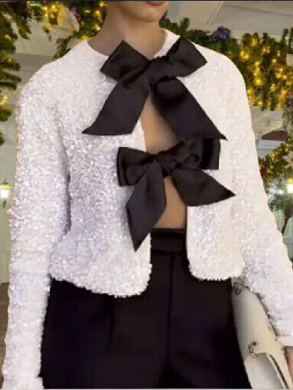 Clara's Stijlvolle Strik-Sequin Jas