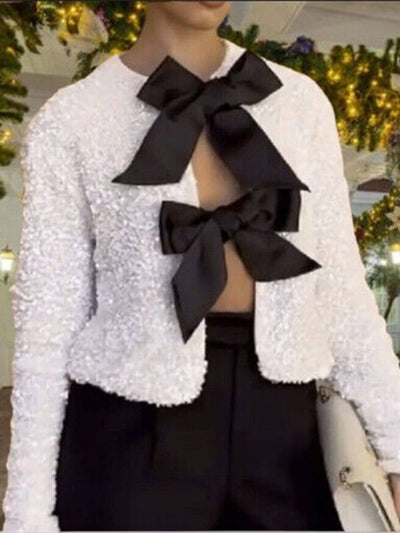 Clara's Stijlvolle Strik-Sequin Jas