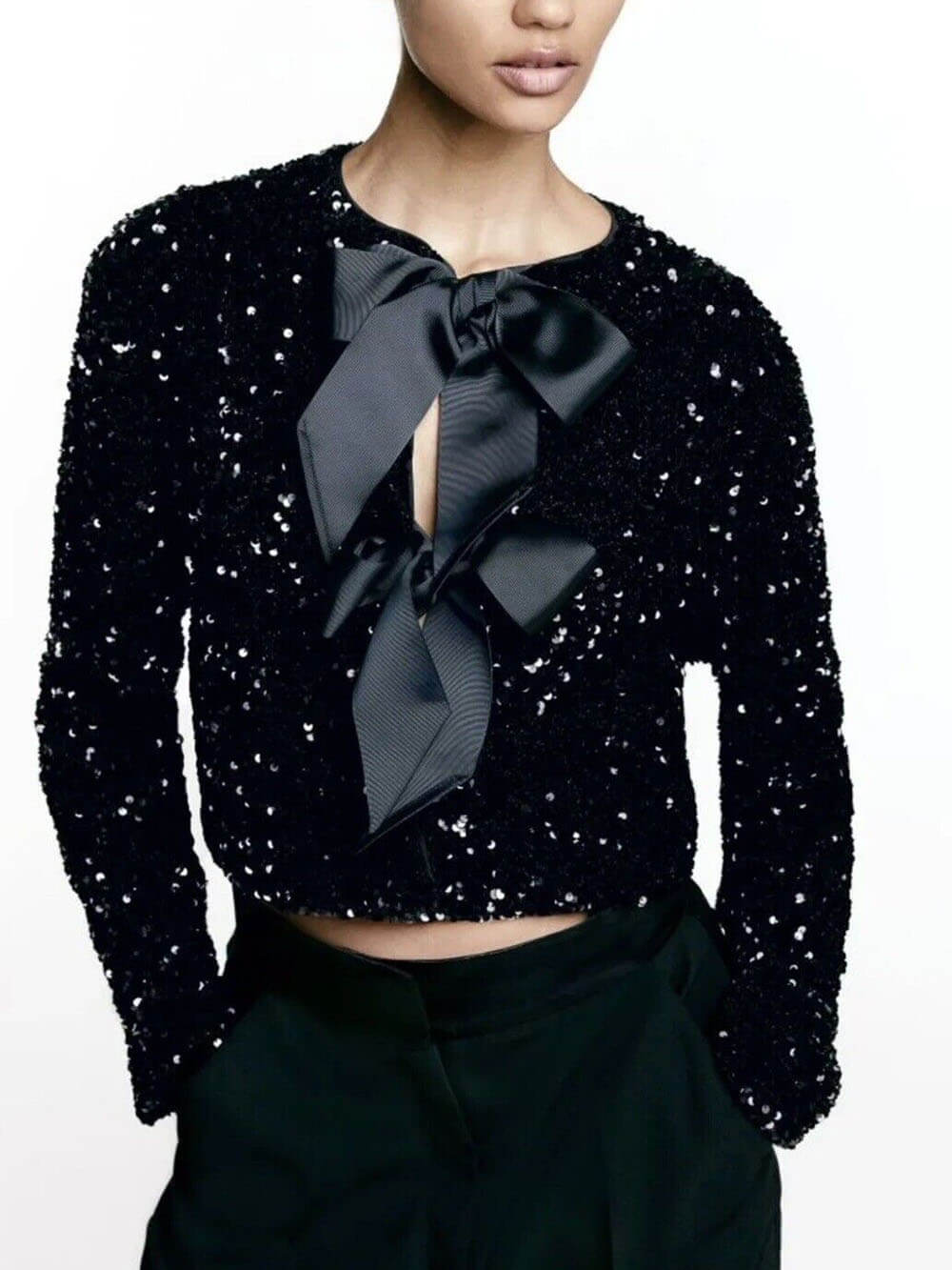 Clara's Stijlvolle Strik-Sequin Jas